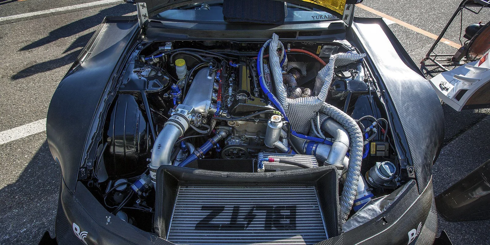 Competition engine bay with intercooler and cooling